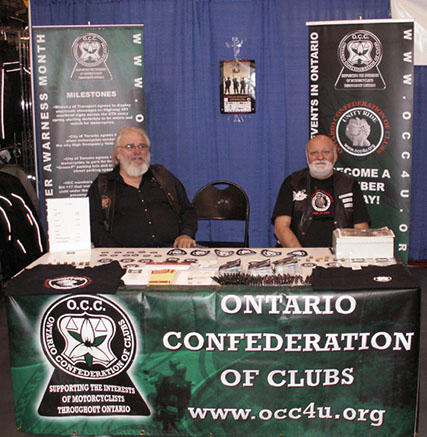 Pastor Dave and Harold at the OCC booth 2012